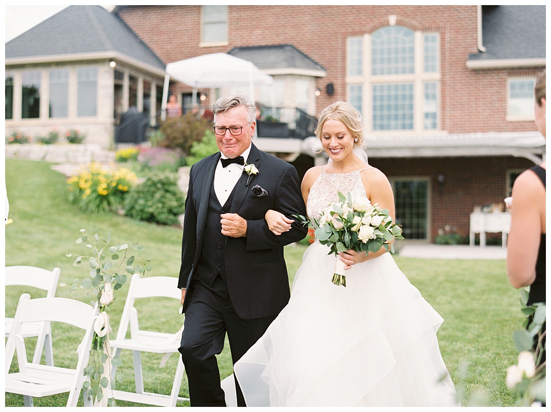 Bride Walking Down Aisle Dad Crying Lush Backyard Wedding on Film Featured on Magnolia Rouge with Sarah Sunstrom Photography