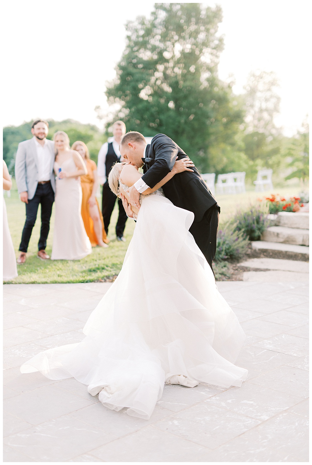 Dip Kiss First Dance Lush Backyard Wedding on Film Featured on Magnolia Rouge with Sarah Sunstrom Photography